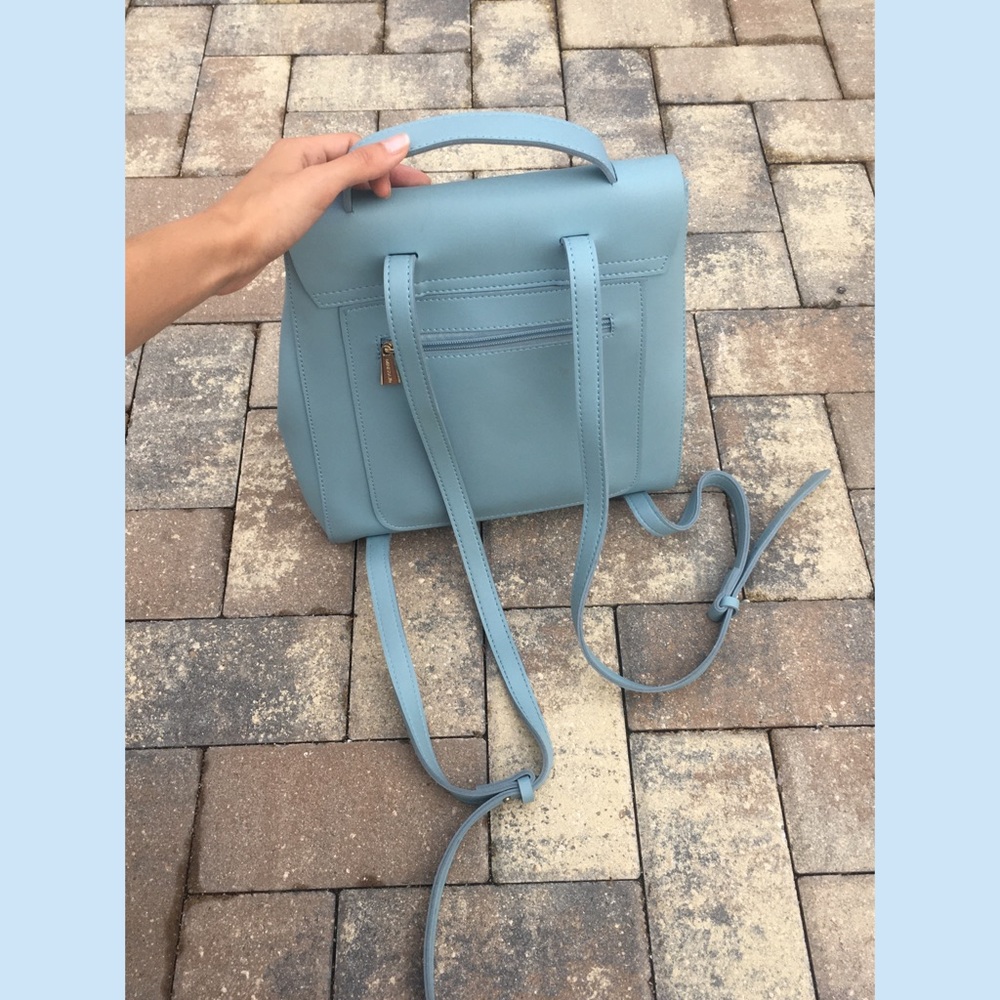 Miniso Life Baby Blue backpack with gold zippers
